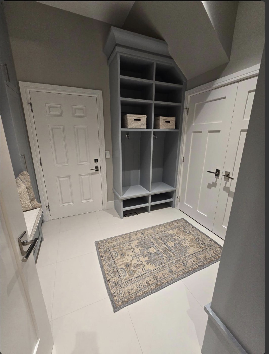 Neatly arranged entryway storage with baskets